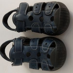 Close toe leahter sandals.